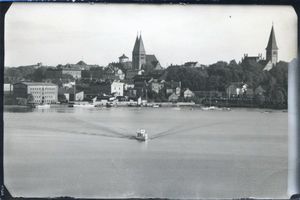 Osterode (Ostpr.), Kreis Osterode Osterode (Ostpr.), Blick über den Drewenzsee zur Ev. Kirche (links) und Kath. Kirche II Osterode, Stadtmotive
