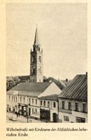 Gumbinnen, Stadt, Kreis Gumbinnen Straße der SA (fr. Wilhelmstraße bzw. Stallupöner Straße) Gumbinnen, Wilhelmstraße mit Kirchturm der Altstädtischen lutherischen Kirche 